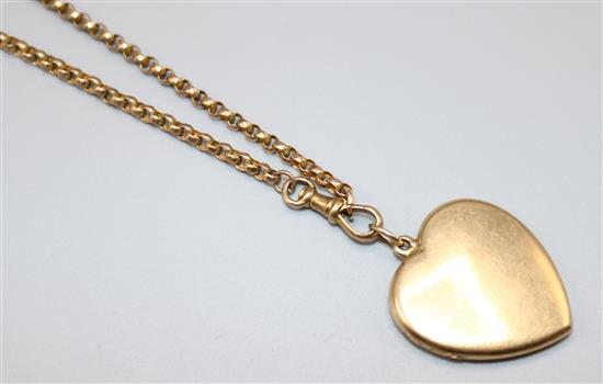 Gold heart locket on chain